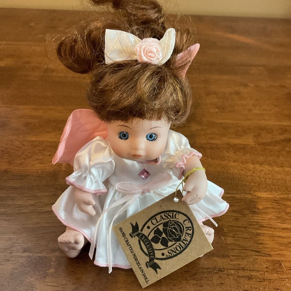 Classic Creations Porcelain Angel Doll October Birthstone Color 7"